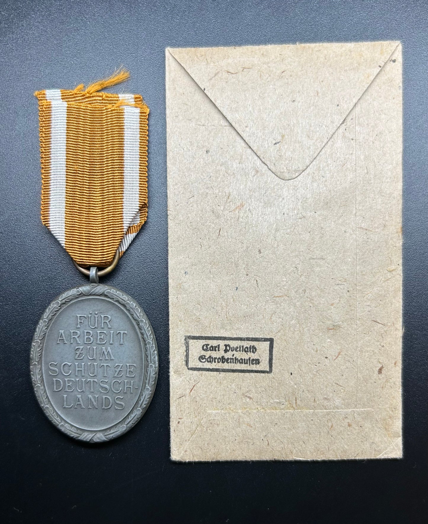 Later produced Westwall medal & packet