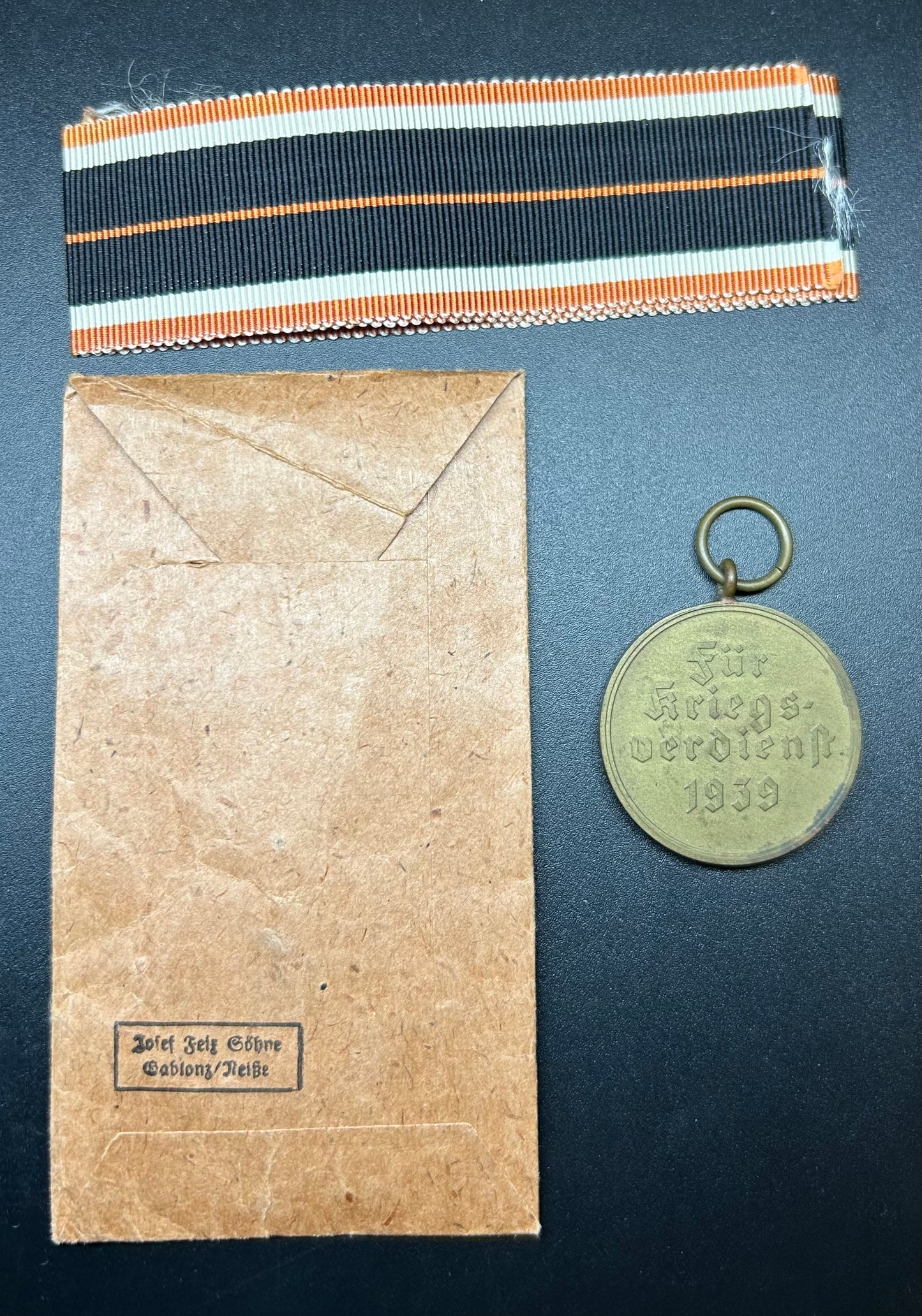 War merit medal w/packet and unissued ribbon